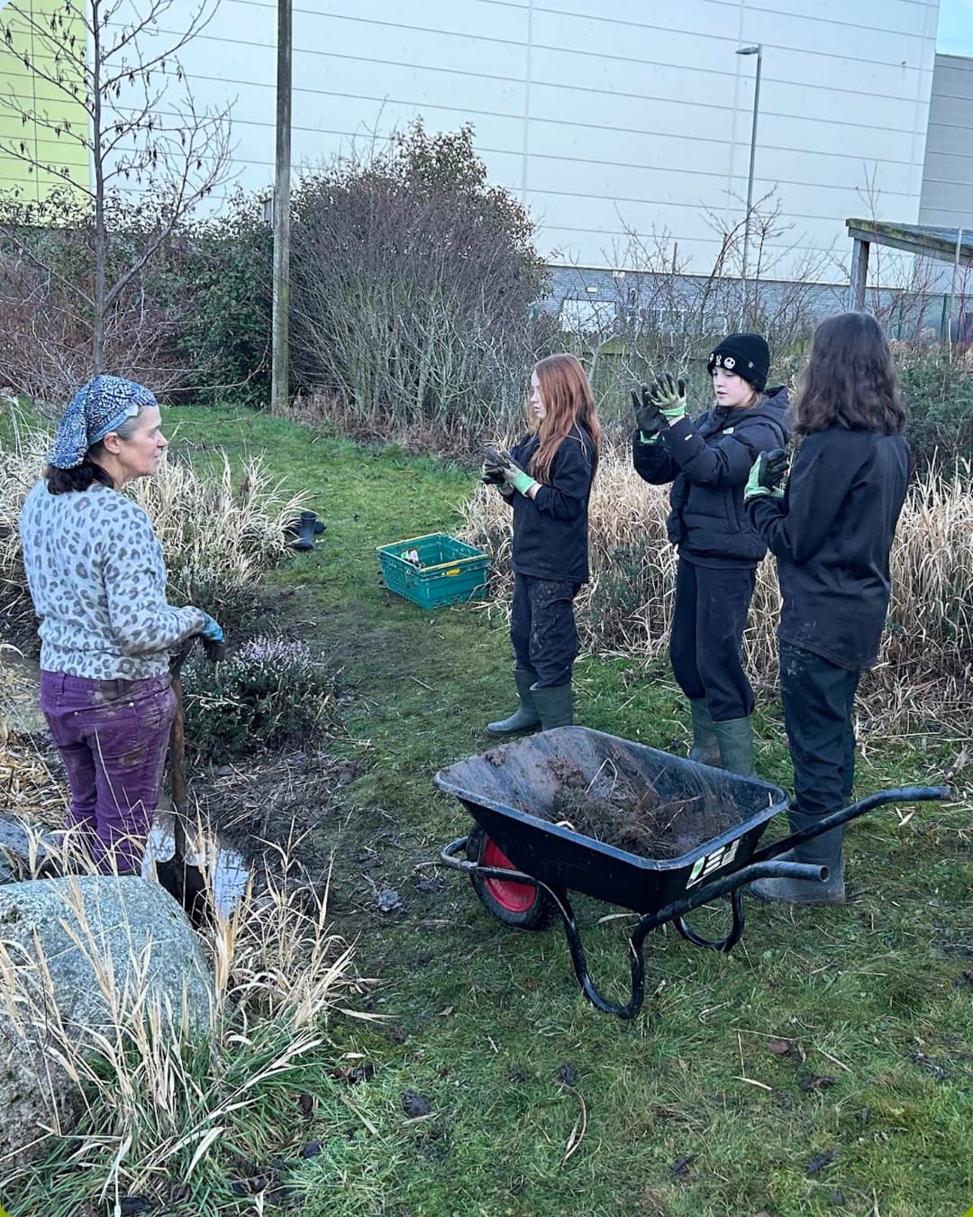 Volunteers carrying out practical habitat work in a community greenspace