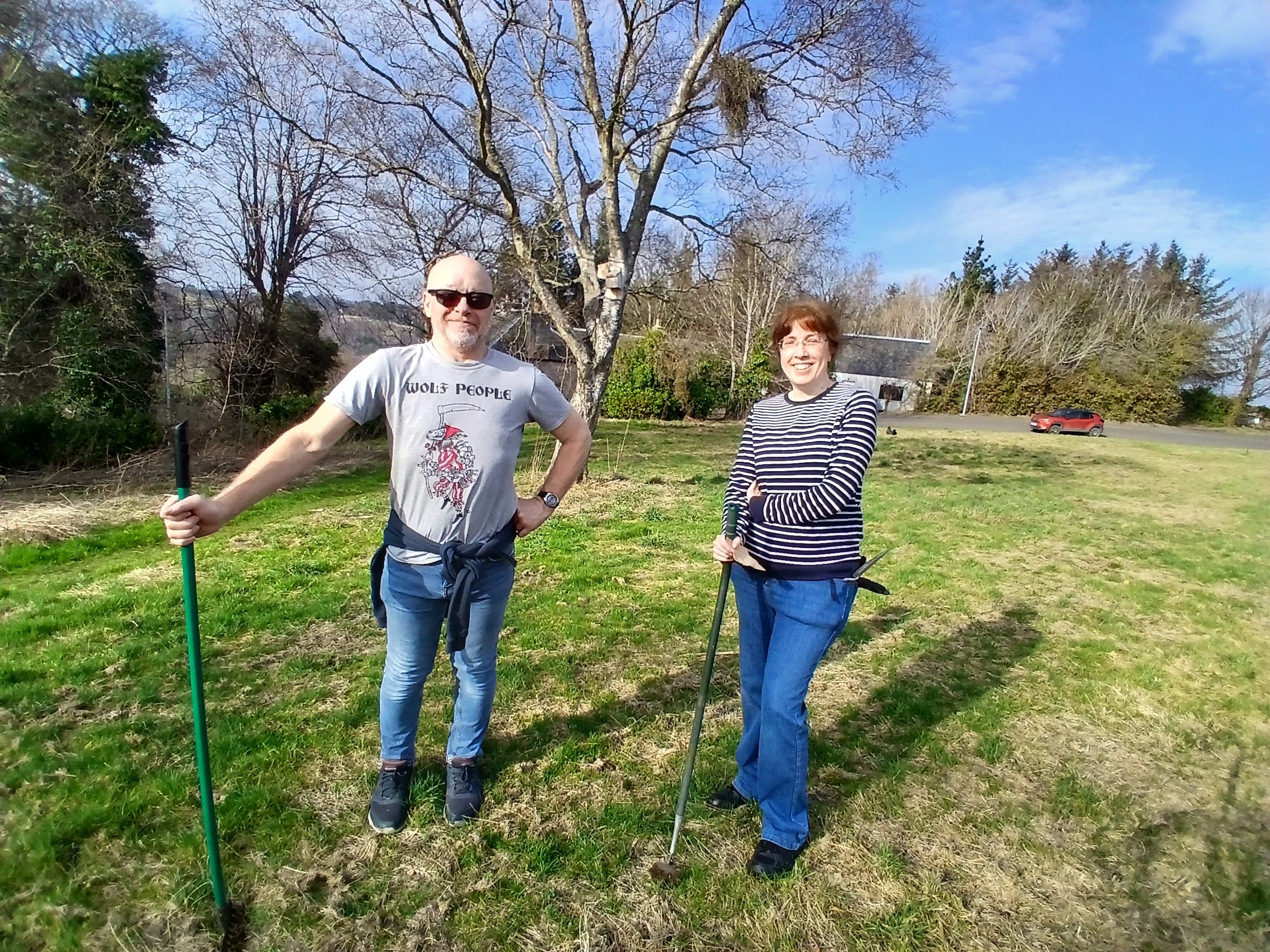 Volunteers taking part in outdoor habitat restoration